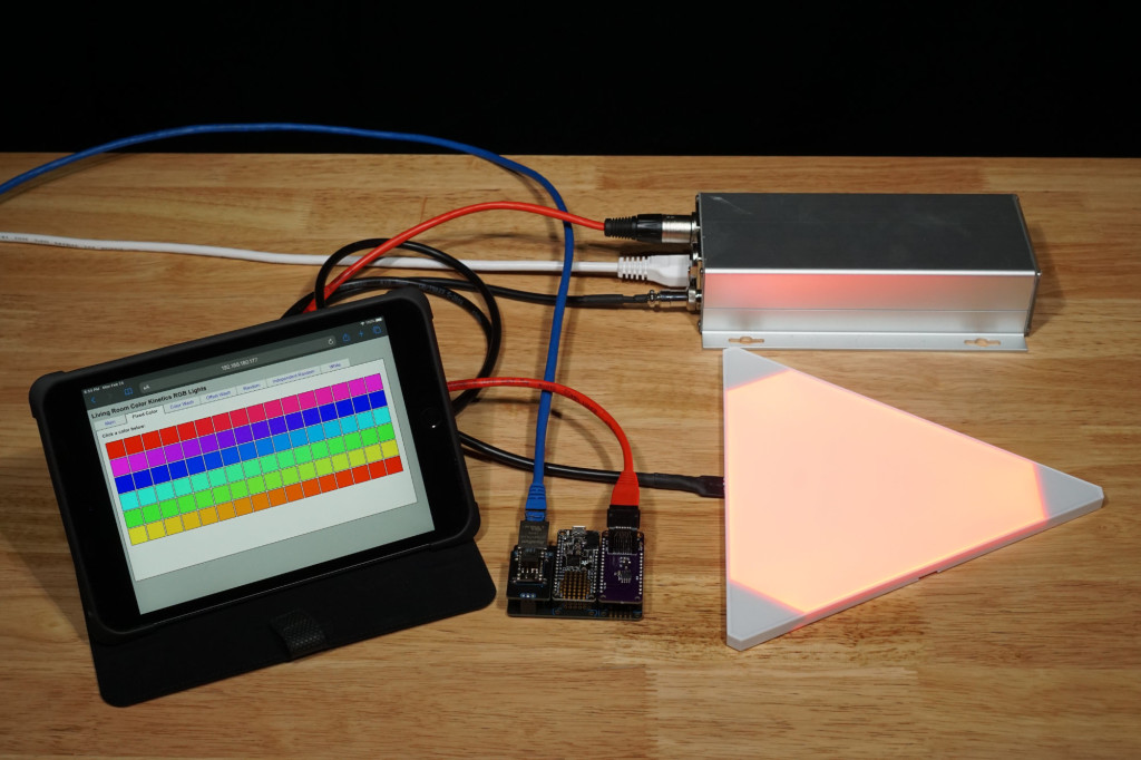 Playing around with the DMX FeatherWing, a Particle Ethernew FeatherWing, an Adafruit Feather M0 Basic Proto, the official Nanoleaf DMX interface, and a Nanoleaf Aurora tile.