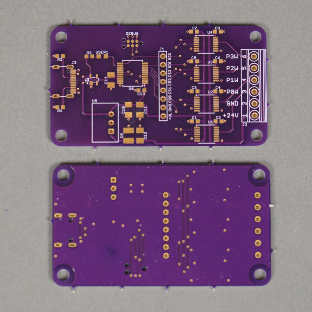 The front and back of the fabbed boards.