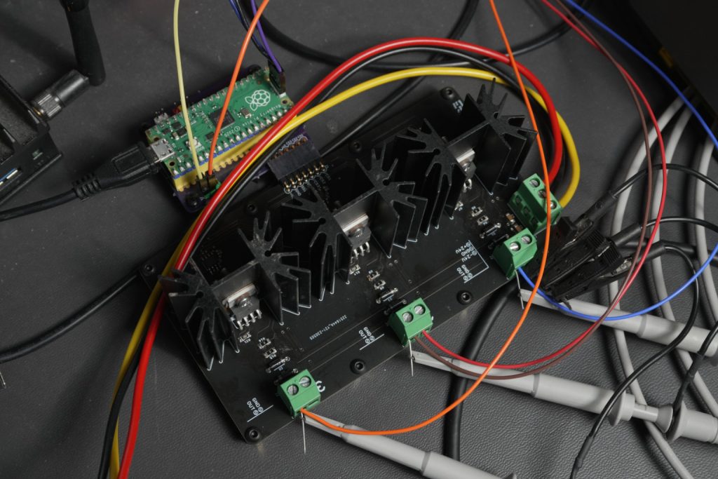 The assembled D2S board connected to the Raapberry Pi Pico development board via a small adapter board. The adapter board routes the Pico's SPI bus signals to the D2S board thus eliminating many jumper wires and increasing the reliability of the setup.