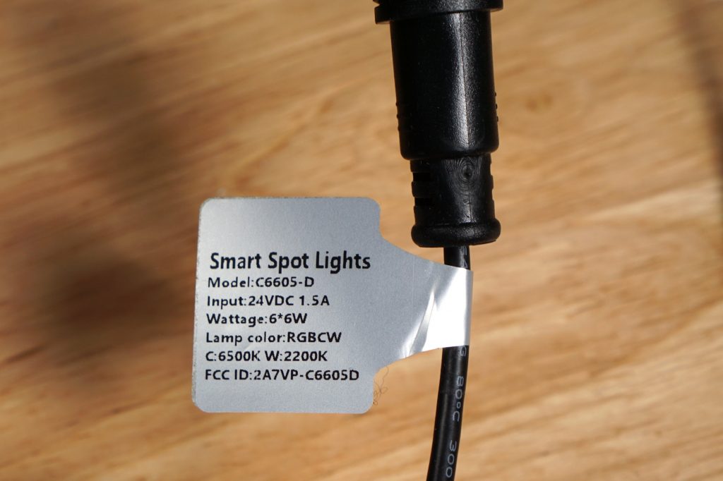 Label on the string of spotlights with the FCC ID.