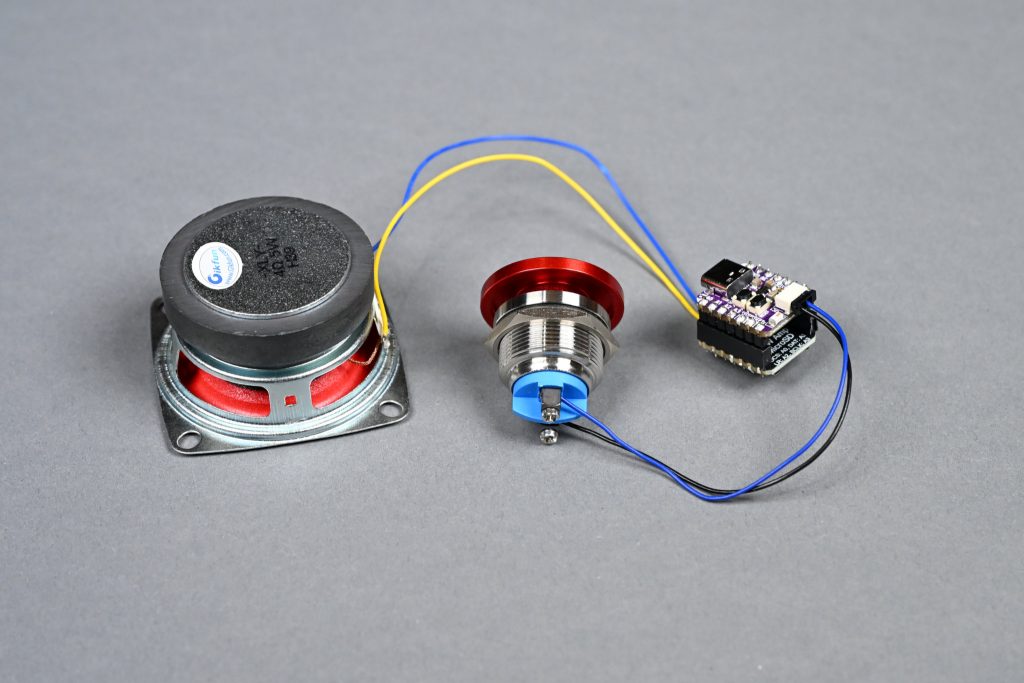 When connected correctly, the speaker and button cables will be on opposite ends of the stack of boards.