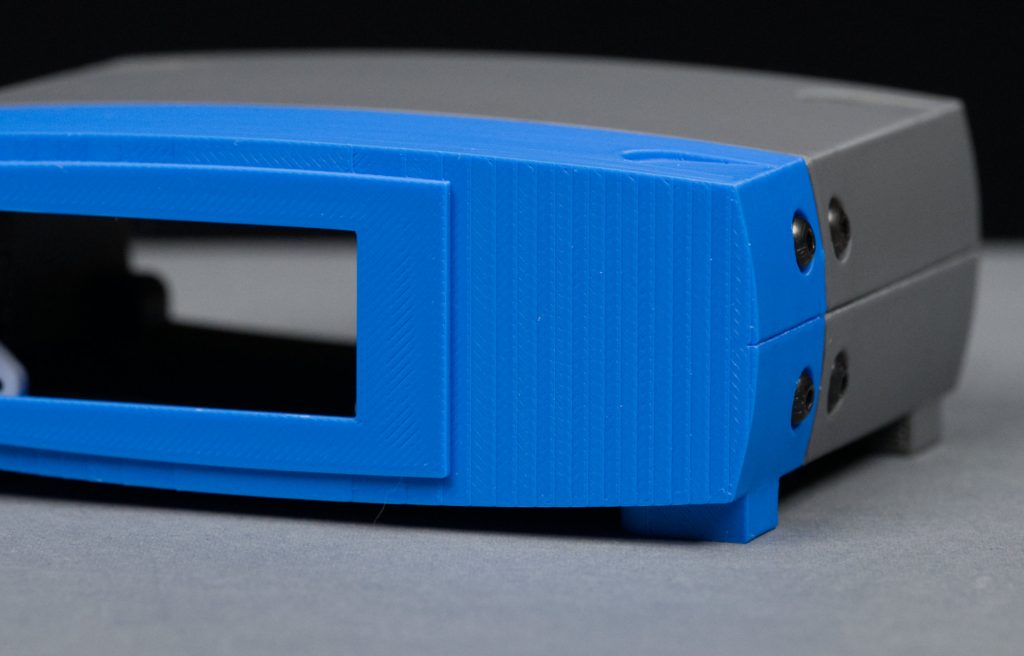 Distinct layers can be seen in the curved face when the single-piece front design is printed face up.