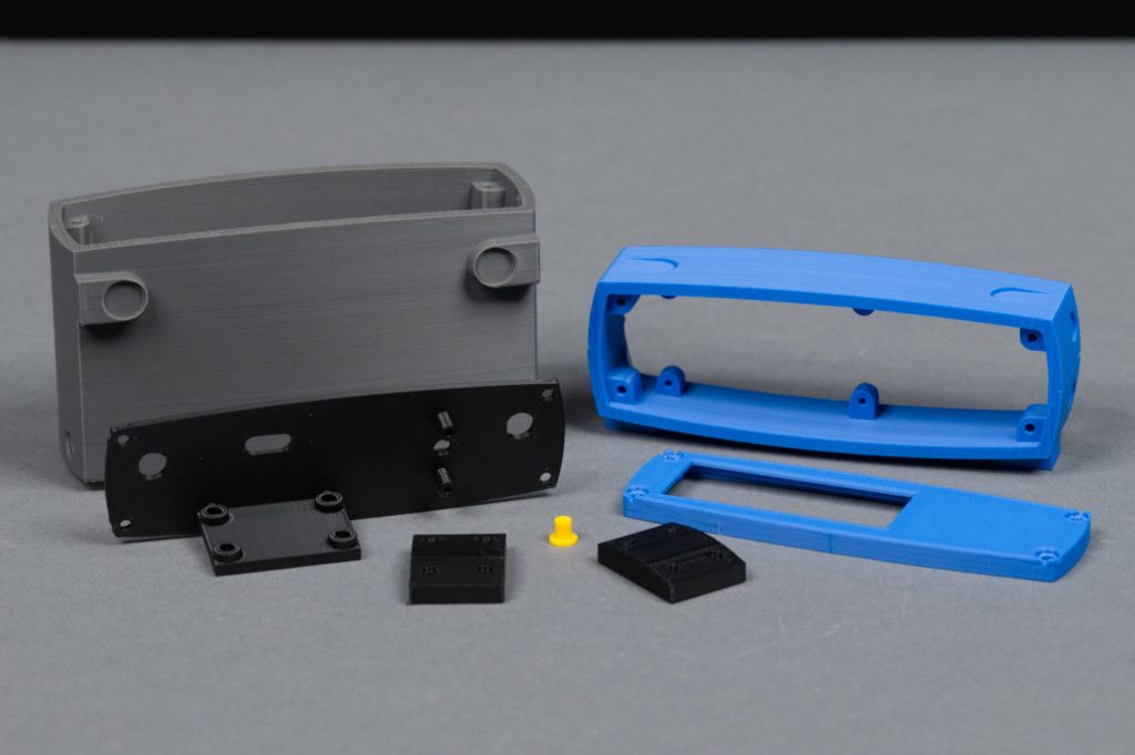 All of the 3D printed plastic components for the router clock.