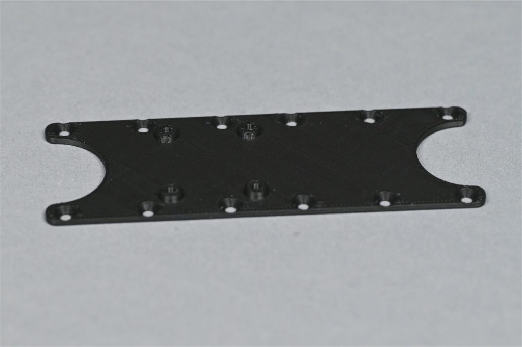New back plate with mounts for the controller board.